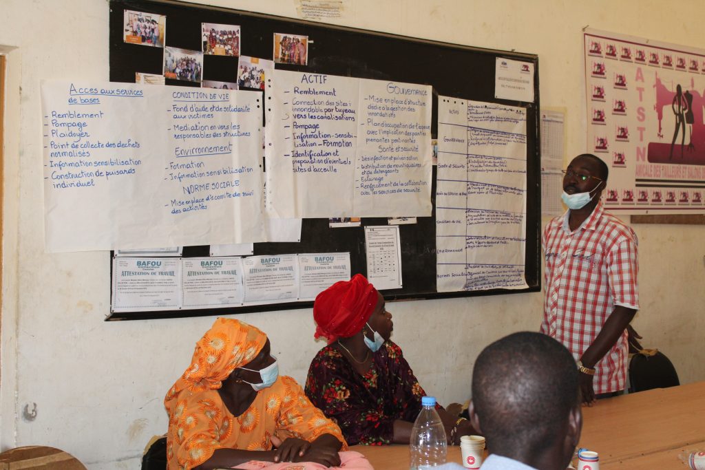 Community members participating in Flood Resilience Measurement for Communities results sharing session in Thiès, Senegal. Photo by Lydia Darby, Practical Action 