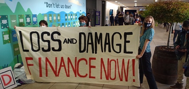 Young activists sharing their message on the importance of finance for loss and damage at COP26. 